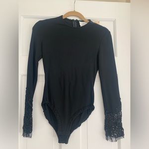 Badgley Mischa bodysuit with beaded lace sleeves.